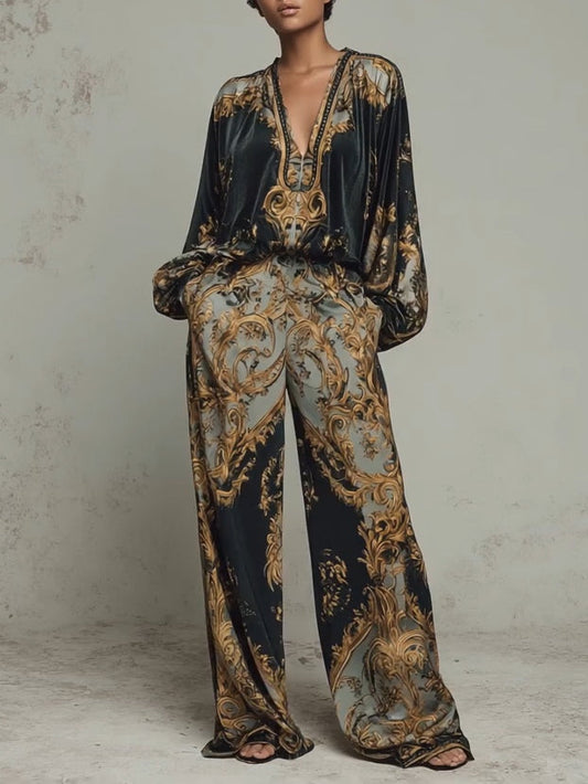 Casual set featuring an ornate baroque floral print top and wide-leg trousers