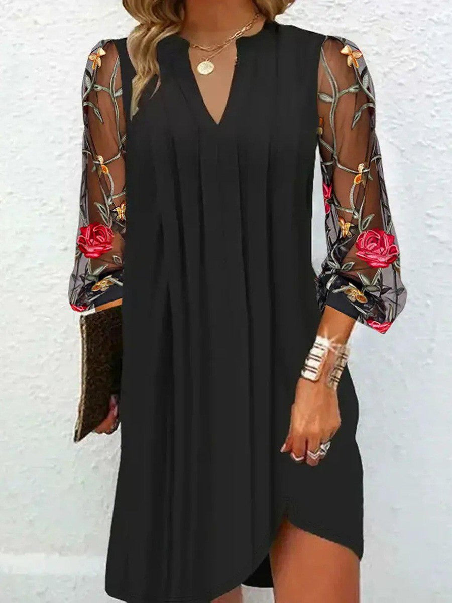 Elegant V-neck mini dress with sheer sleeves