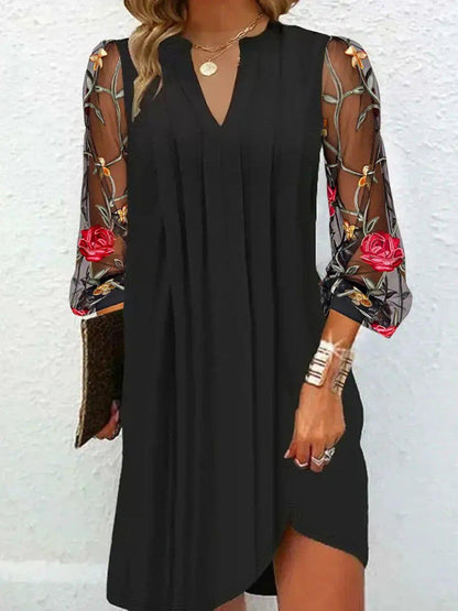 Elegant V-neck mini dress with sheer sleeves