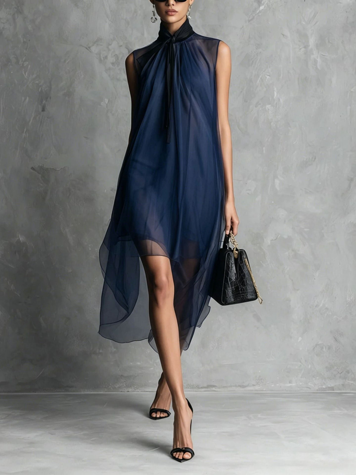 Robe midi asymétrique sans manches en maille transparente avec col à nouer