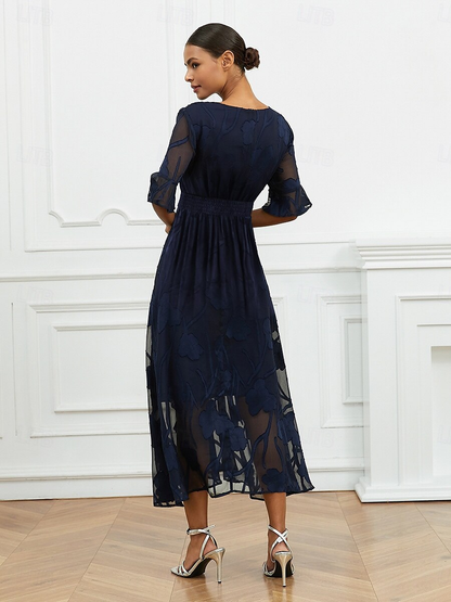 Robe florale col V à manches transparentes