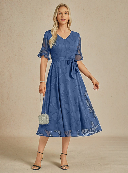 Robe florale col V à manches transparentes