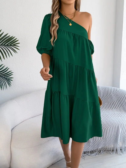 One-shoulder dress with layered ruffles