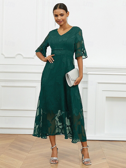 Robe florale col V à manches transparentes