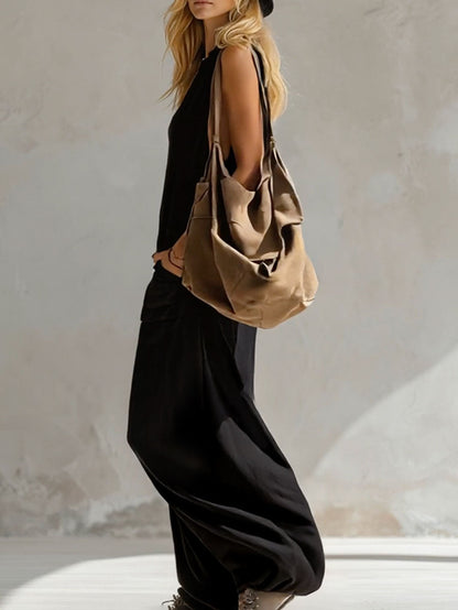Sleeveless V-neck jumpsuit, solid color, wide leg, with buttons and pockets