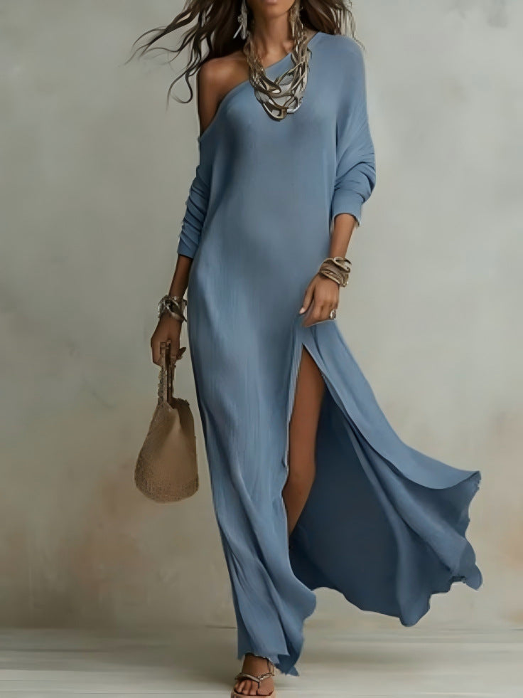 Elegant women's long-sleeved knitted dress, pleated with a slit