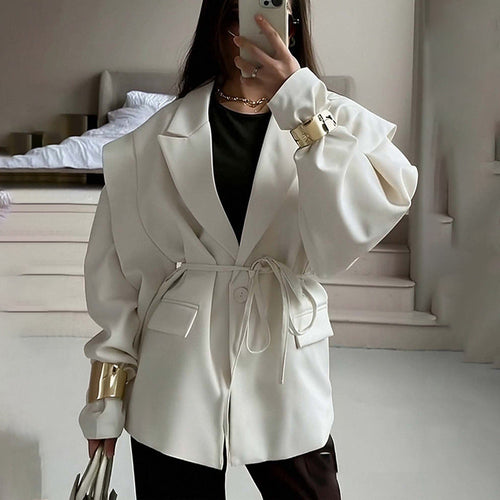 Blazer oversize ceinturé à manches bouffantes – Une élégance moderne et sophistiquée