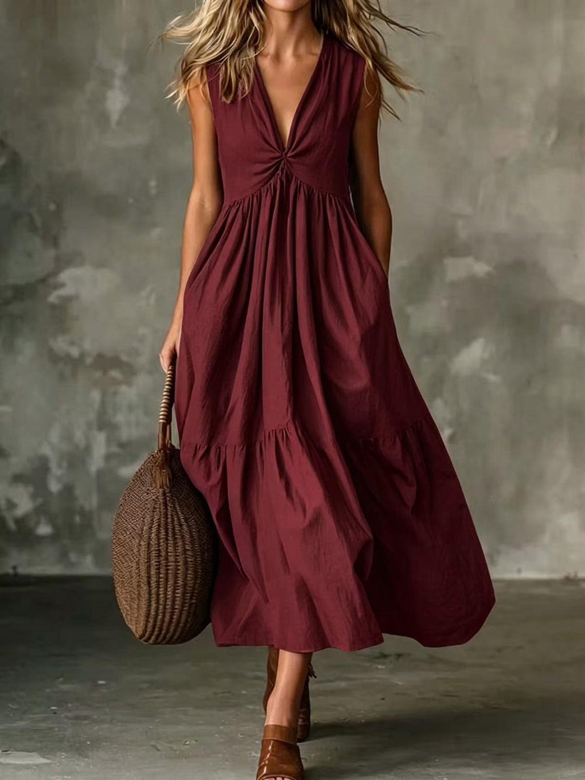 Robe longue texturée ample sans manches à col en V et devant torsadé avec poches