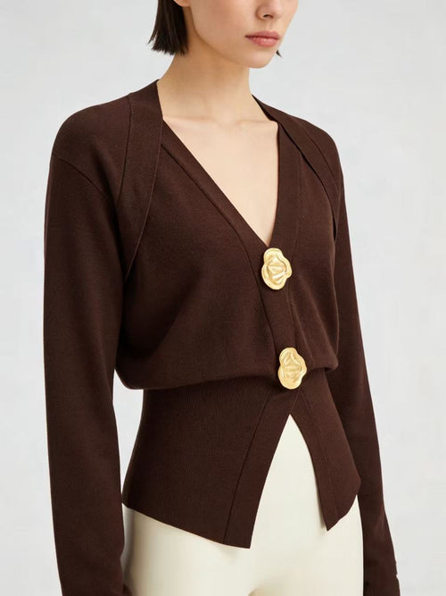 Pull en mélange de laine à col V avec détails métallisés