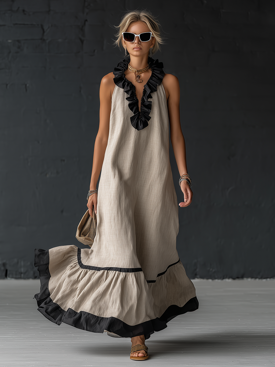 Élégante robe longue en coton et lin, sans manches, avec encolure en V, volants et blocs de couleurs.