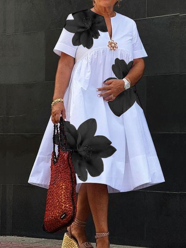 Robe midi plissée à imprimé et col en V