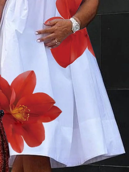 Robe midi plissée à imprimé et col en V