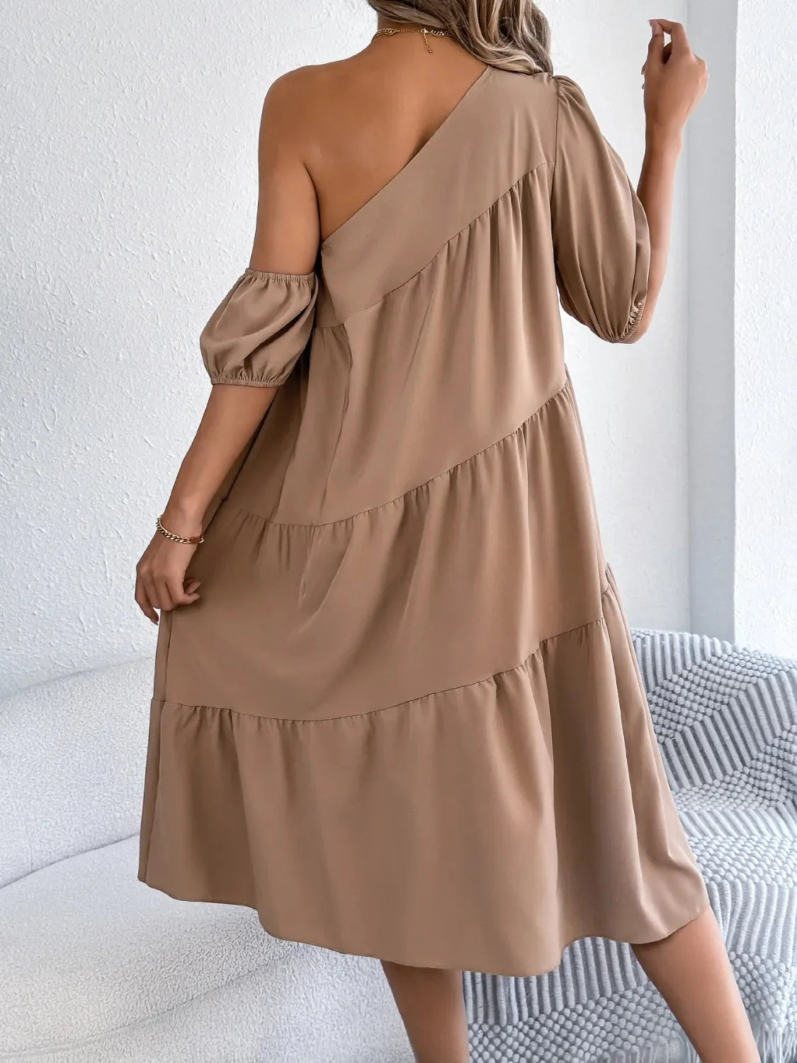 One-shoulder dress with layered ruffles