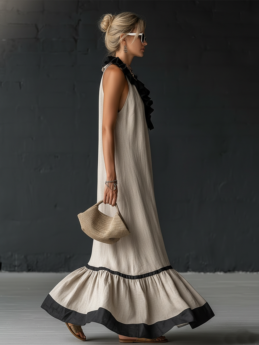 Élégante robe longue en coton et lin, sans manches, avec encolure en V, volants et blocs de couleurs.