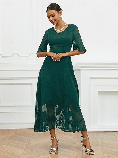 Robe florale col V à manches transparentes