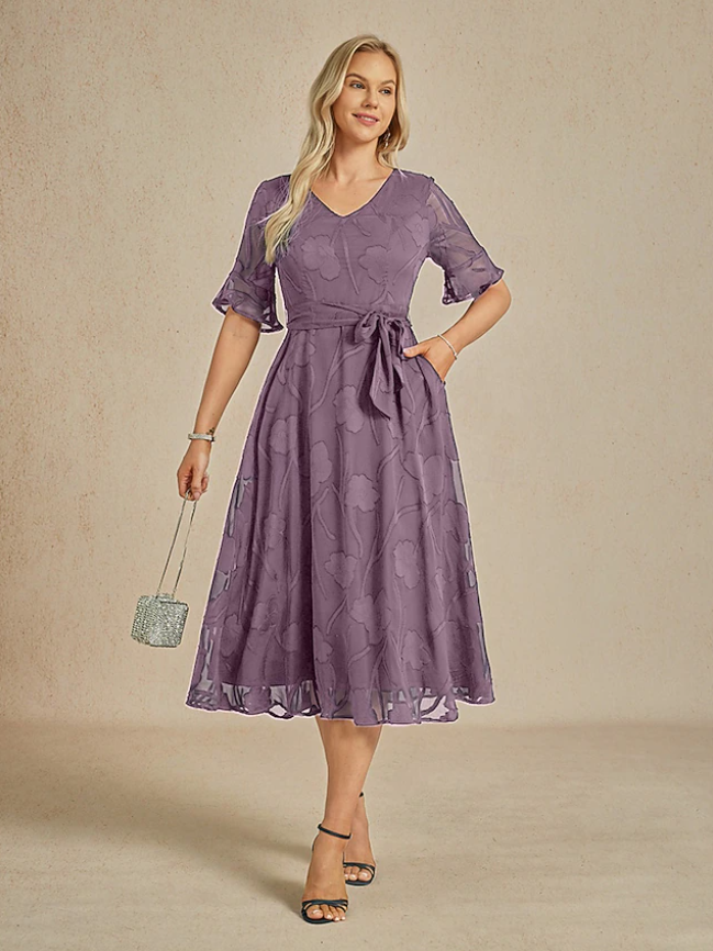 Robe florale col V à manches transparentes