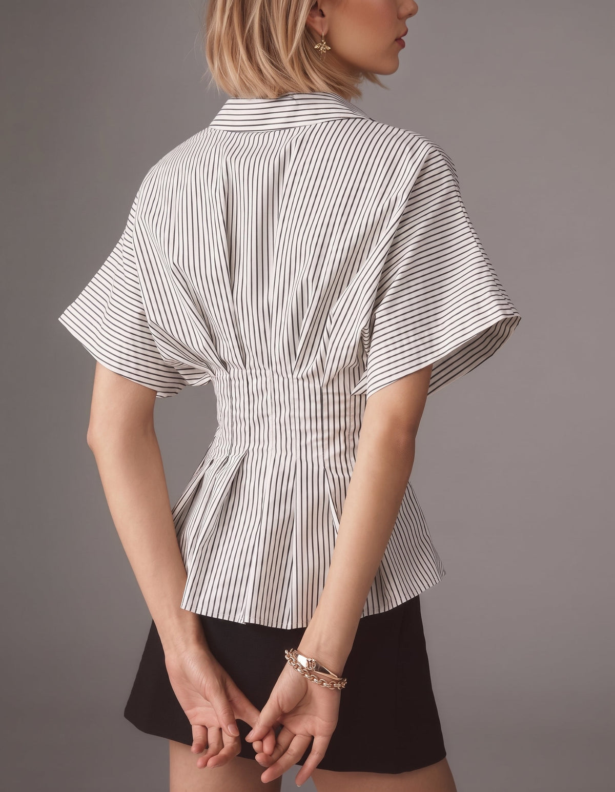Chemise rayée à col, manches flottantes et taille cintrée avec basques