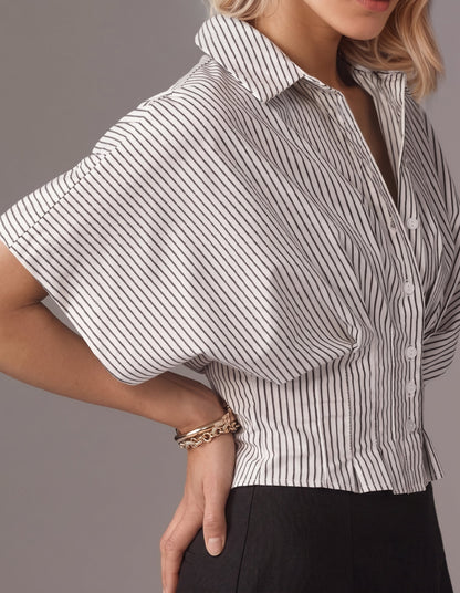 Chemise rayée à col, manches flottantes et taille cintrée avec basques