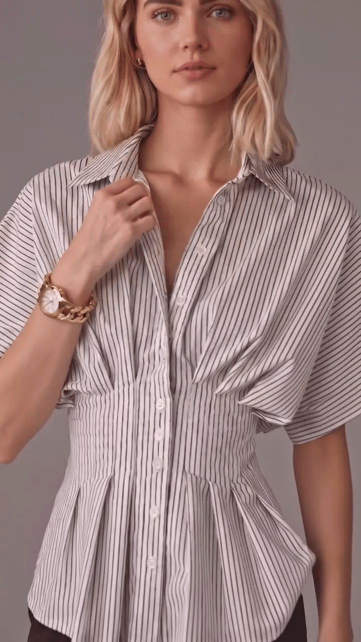 Chemise rayée à col, manches flottantes et taille cintrée avec basques