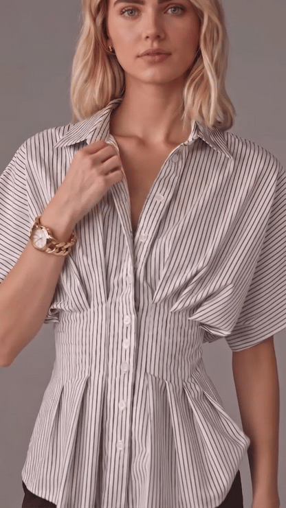 Chemise rayée à col, manches flottantes et taille cintrée avec basques