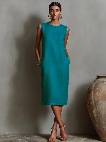 Robe chemise en lin orange pour femme avec encolure ronde sans manches et poches latérales, une robe au style intemporel, minimaliste et élégant
